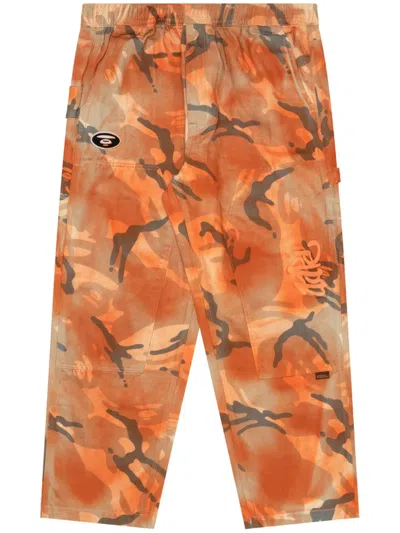 Aape By A Bathing Ape Spray Paint-effect Camouflage Trousers In Orange
