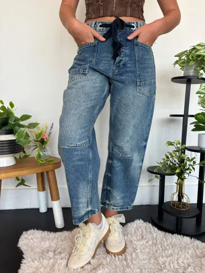 Aaron & Amber Eyelet Waist Medium Wash Barrel Denim Jeans In Blue