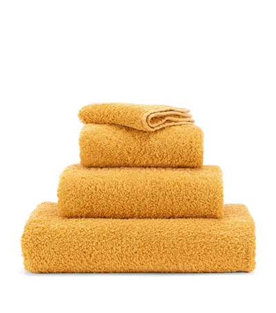 Abyss & Habidecor Super Pile Face Cloth In Yellow