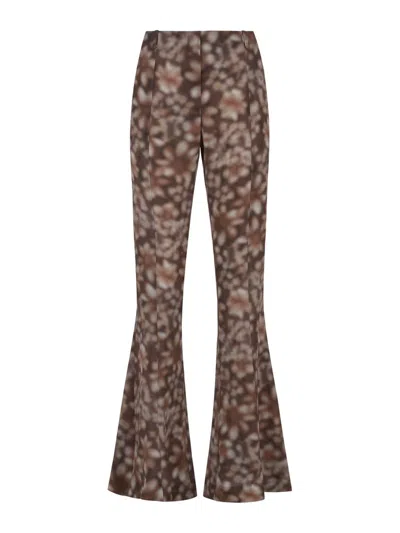 Acne Studios Abstract Printed Flared Hem Trousers In Brown