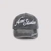 Acne Studios Carliy Tourist Logo-embroidered Cotton Cap In Black