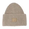 Acne Studios Large Face Logo Beanie In Brown