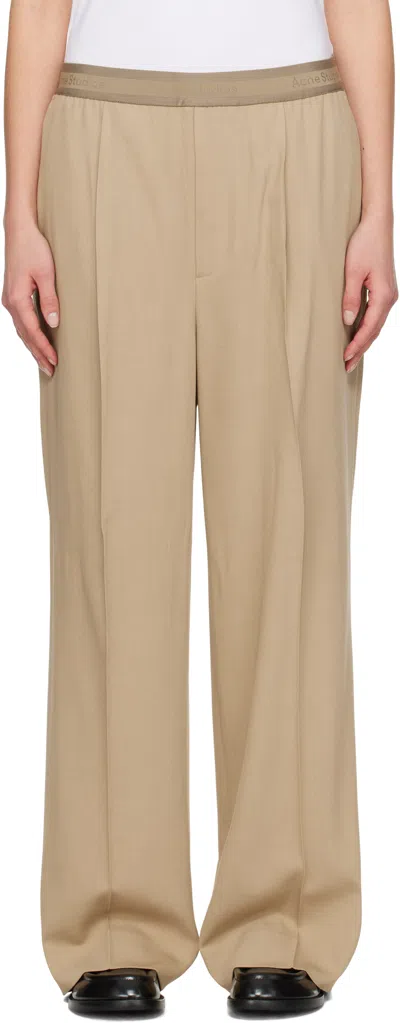 Acne Studios Beige Logo Tape Trousers In Dfj Camel Beige