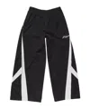 Acne Studios Color-blocked Piping Casual Pants In Black