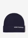 Acne Studios Distressed Logo Beanie In Blue