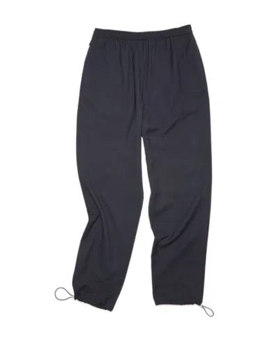 Acne Studios Elasticated-waist Tapered Trousers In Black