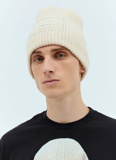 Acne Studios Embellished Face Logo Beanie Hat In Beige