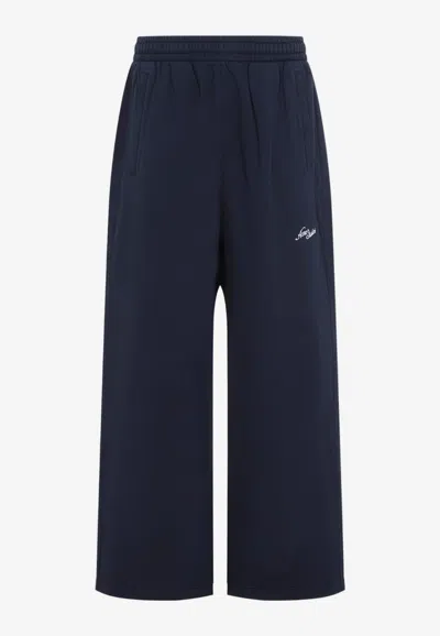 Acne Studios Embroidered Logo Wide-leg Pants In Blue
