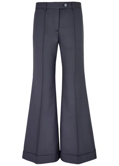 Acne Studios Flared-leg Woven Trousers In Blue