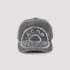 Acne Studios Distressed Curved Brim Hat With Eyelet Vents In Gray