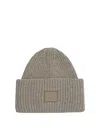Acne Studios Pansy Face Ribbed Wool-blend Beanie In Brown