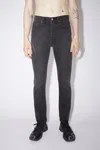Acne Studios Slim Tapered Jeans In Used Black