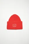 Acne Studios Large Face Logo Beanie In Sharp Red