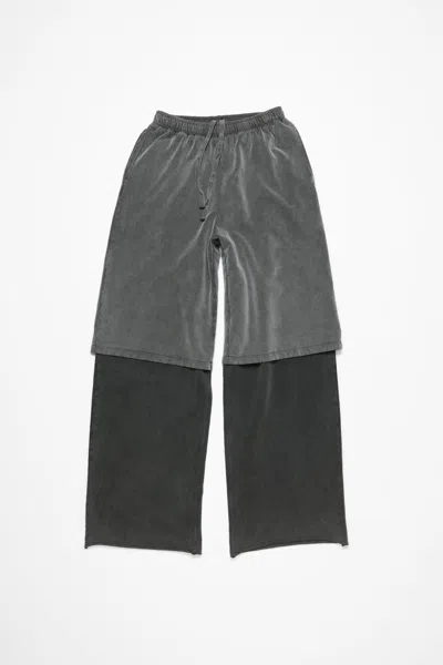 Acne Studios Layered Trousers In Anthracite/black