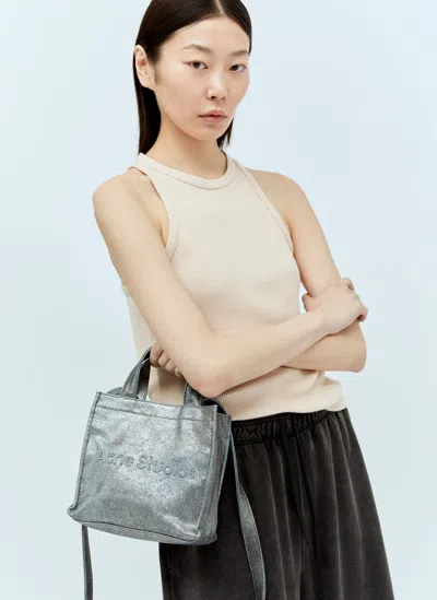 Acne Studios Logo Embossed Mini Tote Bag In Silver