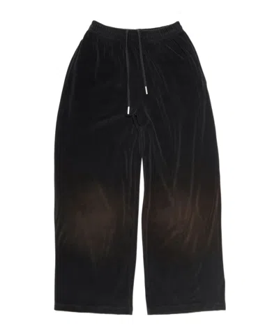 Acne Studios Logo-embossed Velvet Trousers In Black