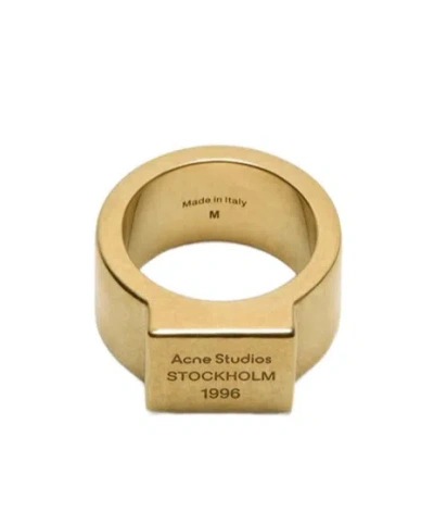 Acne Studios Logo Engraved Signet Ring In Gold