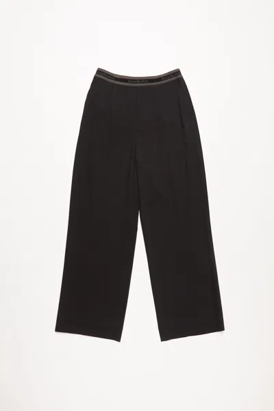 ACNE STUDIOS LOGO TAPE TROUSERS