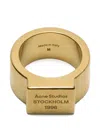 Acne Studios Logo-engraved Square-face Ring In Gold