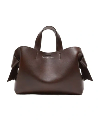 ACNE STUDIOS ACNE STUDIOS MUSUBI LOGO PRINTED MIDI TOTE BAG