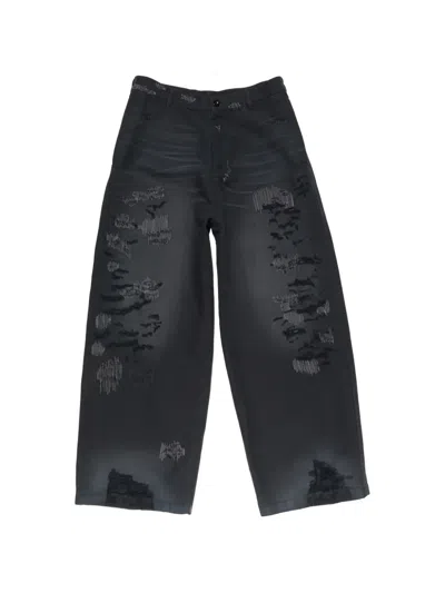 Acne Studios Mended Distressed Trousers In Black
