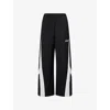 Acne Studios Color-blocked Piping Casual Pants In Black