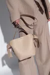 Acne Studios Mini Musubi Leather Top Handle Bag In Beige