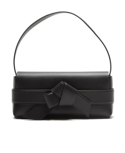 Acne Studios Musubi Elongated Bow Detail Leather Crossbody Bag In Black