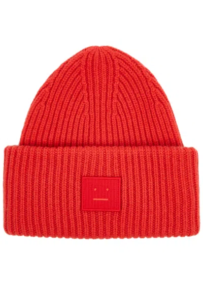 Acne Studios Pansy Ribbed Wool Beanie In Red