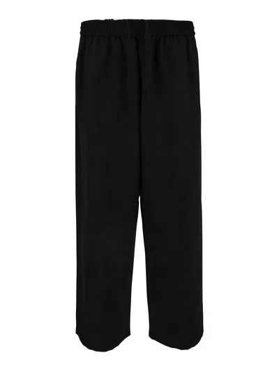 Acne Studios Trousers With Side Pockets In Black