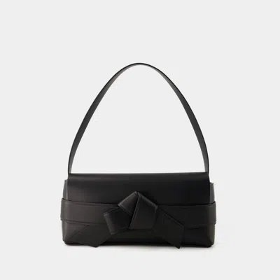 Acne Studios Musubi Elongated Bow Detail Leather Crossbody Bag In Black