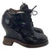 Acne Studios Spin Brogue Wedge Boots In Black Leather In Black