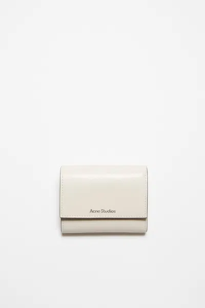 Acne Studios Trifold Leather Wallet In Neutral