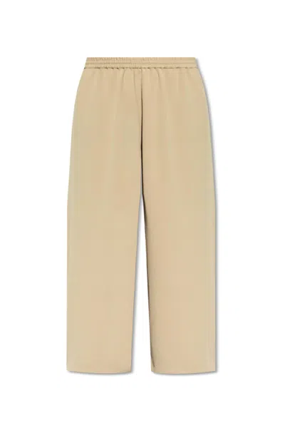 Acne Studios Trousers With Logo In Beige