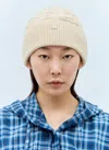 Acne Studios Logo-jacquard Cable-knit Wool-blend Beanie In Cream