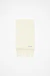 Acne Studios Logo Detailed Fringed Edge Scarf In Warm White