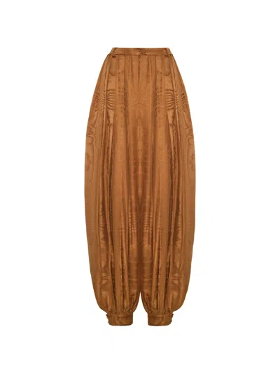 Adam Lippes Sarouel Moiré-effect Pleated Trousers In Brown