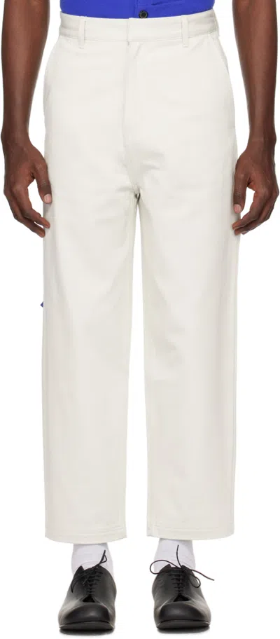Ader Error Beige Patch Trousers In Ivory