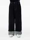 Ader Error Cuffed Jeans In Black