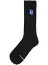 Ader Error Trs Tag Ribbed Calf Socks In Black
