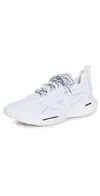 Adidas By Stella Mccartney Asmc Solarglide Cutout Runner Sneakers In Ftwwht/actora/whtvap