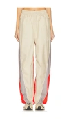 Adidas By Stella Mccartney Panelled Track Pants In Desert Sand & Active Red