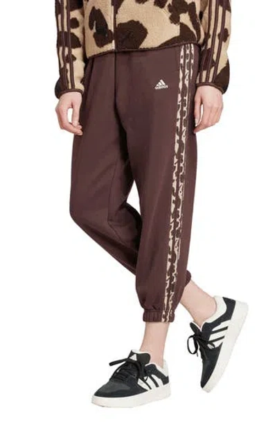 Adidas Originals Adidas Essentials 3-stripe Animal Print Crop Pants In Dark Brown/multicolor
