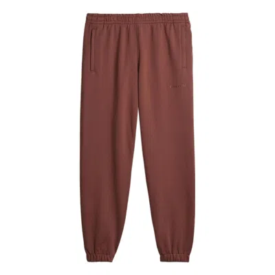 Adidas Originals Adidas X Pharrell Humanrace Small Logo Sweatpants 'burgundy Red' In Brown