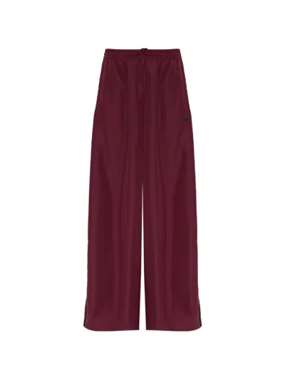 Adidas Originals Firebird Adilenium Track Pants In Red
