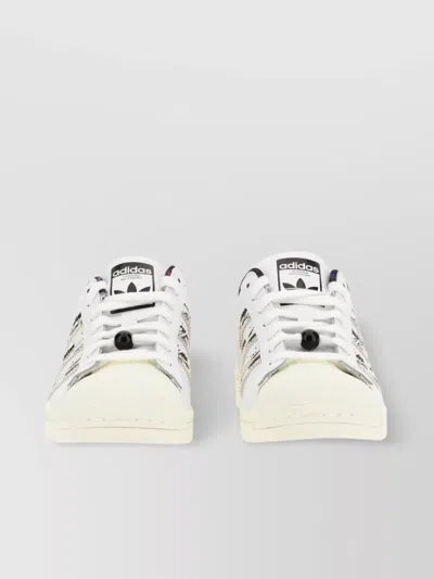 Adidas Originals Iconic Low-top Sneaker With Patterned Rubber Sole