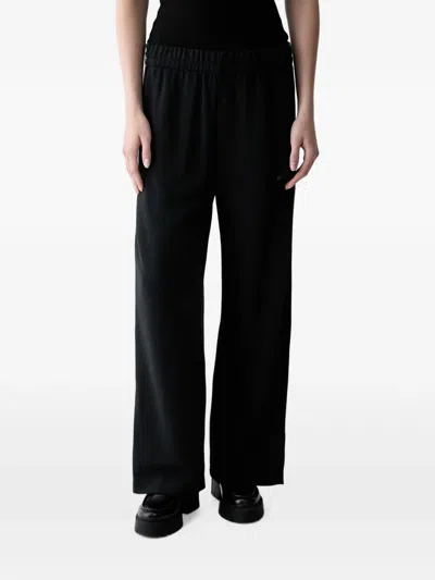 Adidas Originals Leopard-print-stripe Track Pants In Black