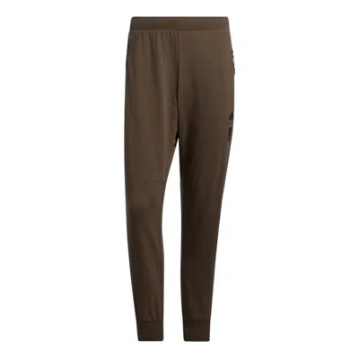Adidas Originals Men's Adidas Wj Kn Pnt Solid Color Logo Printing Bundle Feet Sports Pants/trousers/joggers Dark Grey In Brown
