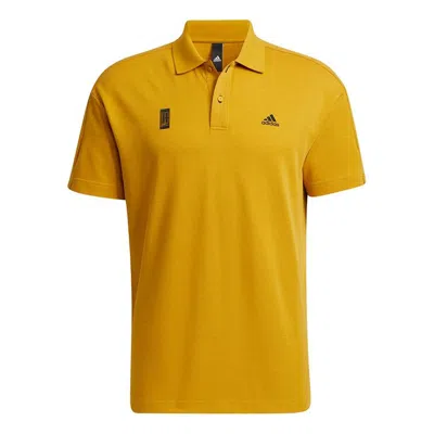 Adidas Originals Men's Adidas Wj Polo Martial Arts Series Logo Printing Solid Color Sports Short Sleeve Gold Color Po In Yellow