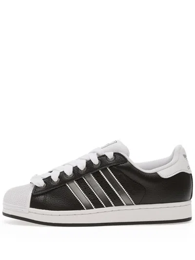 ADIDAS ORIGINALS SHELL-TOE THREE-STRIPE TRAINERS